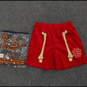 Eric Emanuel Red Mesh Shorts with Pale Yellow Bone Motif